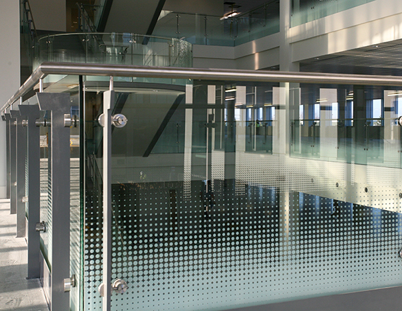 Image shows patterned glass atrium as an example of work by toughened glass manufacturers Kite Glass Weybridge