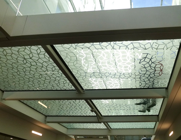 Image shows patterned laminated glass flooring from below, to highlight the work of 'toughened glass manufacturers Kite Glass Weybridge